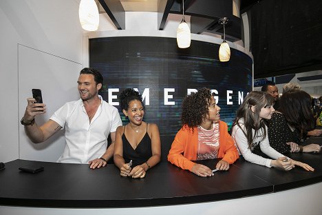 The cast and executive producers of EMERGENCE signed autographs at the ABC Booth, where exclusive merchandise is being made available. - Owain Yeoman, Zabryna Guevara, Ashley Aufderheide, Alexa Swinton