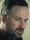 Fincher a Cizinci v letadle