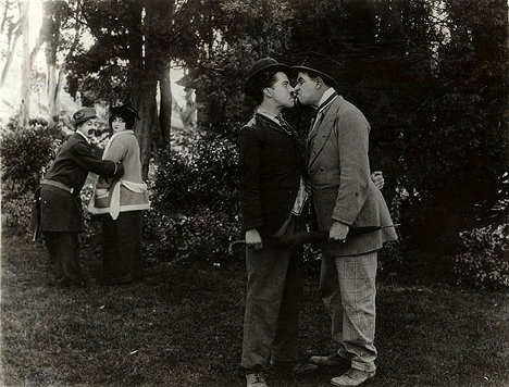 Charlie Chaplin, Ford Sterling - Between Showers - Photos