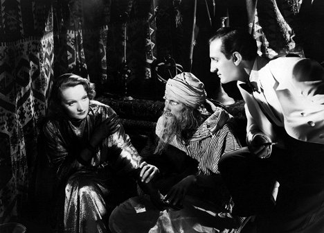 Marlene Dietrich, John Carradine, Basil Rathbone - The Garden of Allah - Photos