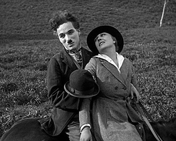Zaháľači - Z filmu - Charlie Chaplin, Edna Purviance
