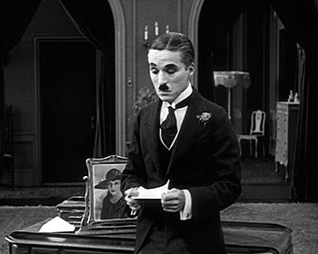 Zaháľači - Z filmu - Edna Purviance, Charlie Chaplin