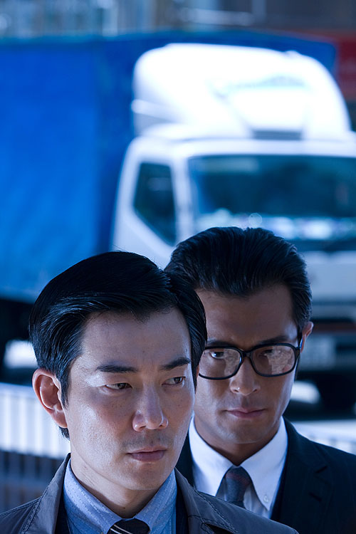 Yi wai - De la película - Richie Ren, Louis Koo