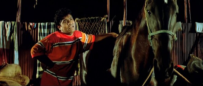 Karan Arjun - De la película - Johny Lever