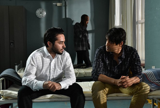 El otro lado de la esperanza - De la película - Sherwan Haji, Simon Al-Bazoon