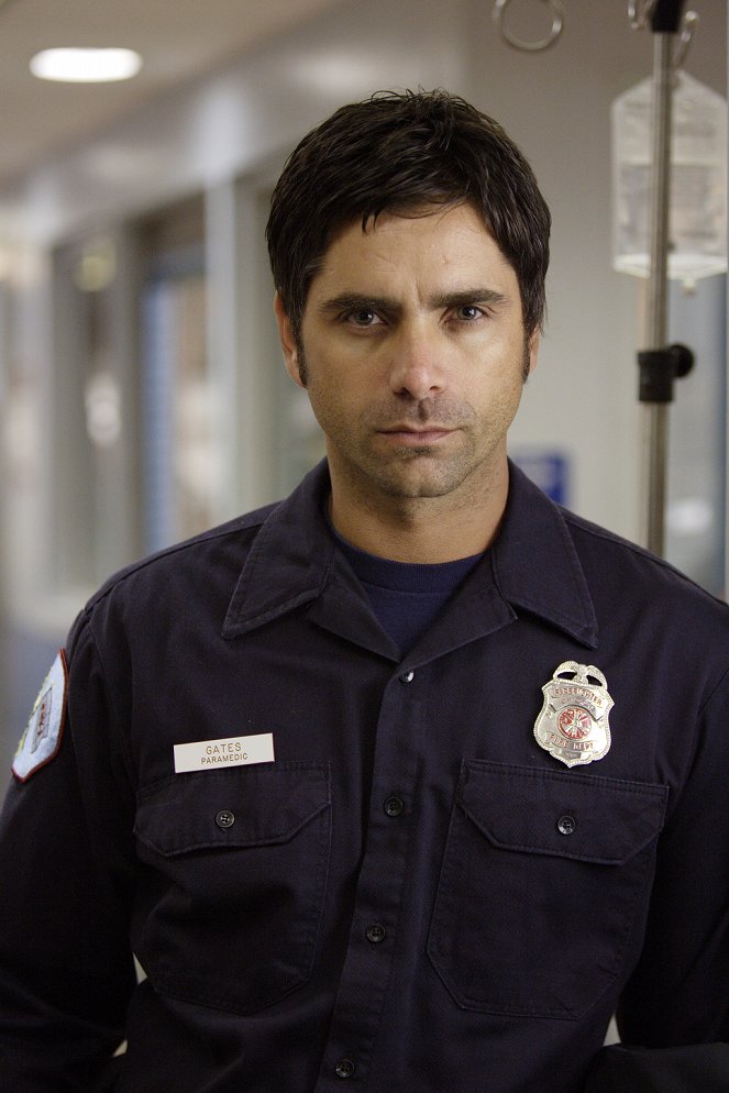 ER - Season 12 - The Human Shield - Photos - John Stamos