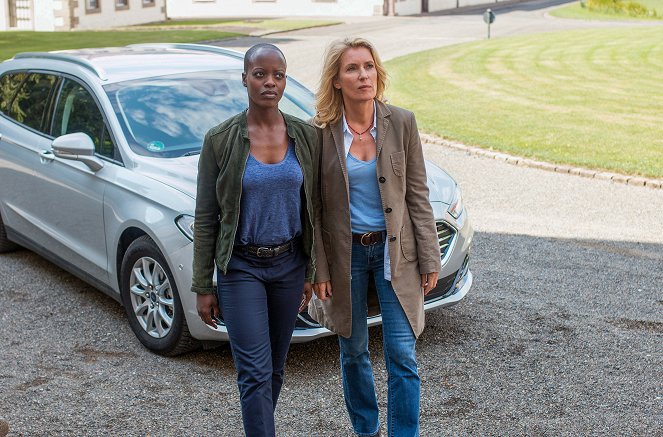 Tatort - Krieg im Kopf - Photos - Florence Kasumba, Maria Furtwängler