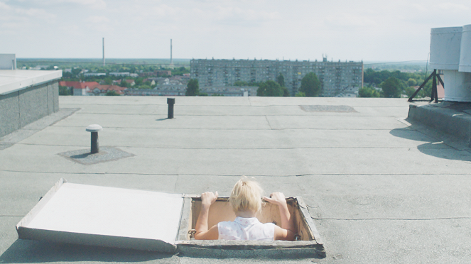 Woman on the Roof - Photos