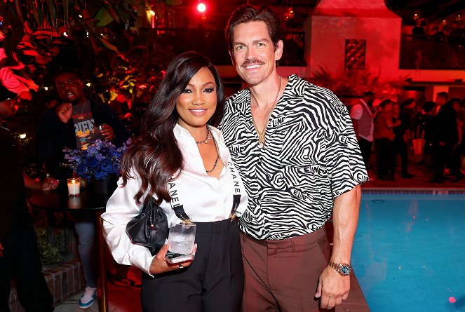 Denní směna - Z akcií - World Premiere of Netflix's "Day Shift" on August 10, 2022 in Los Angeles, California - Garcelle Beauvais, Steve Howey